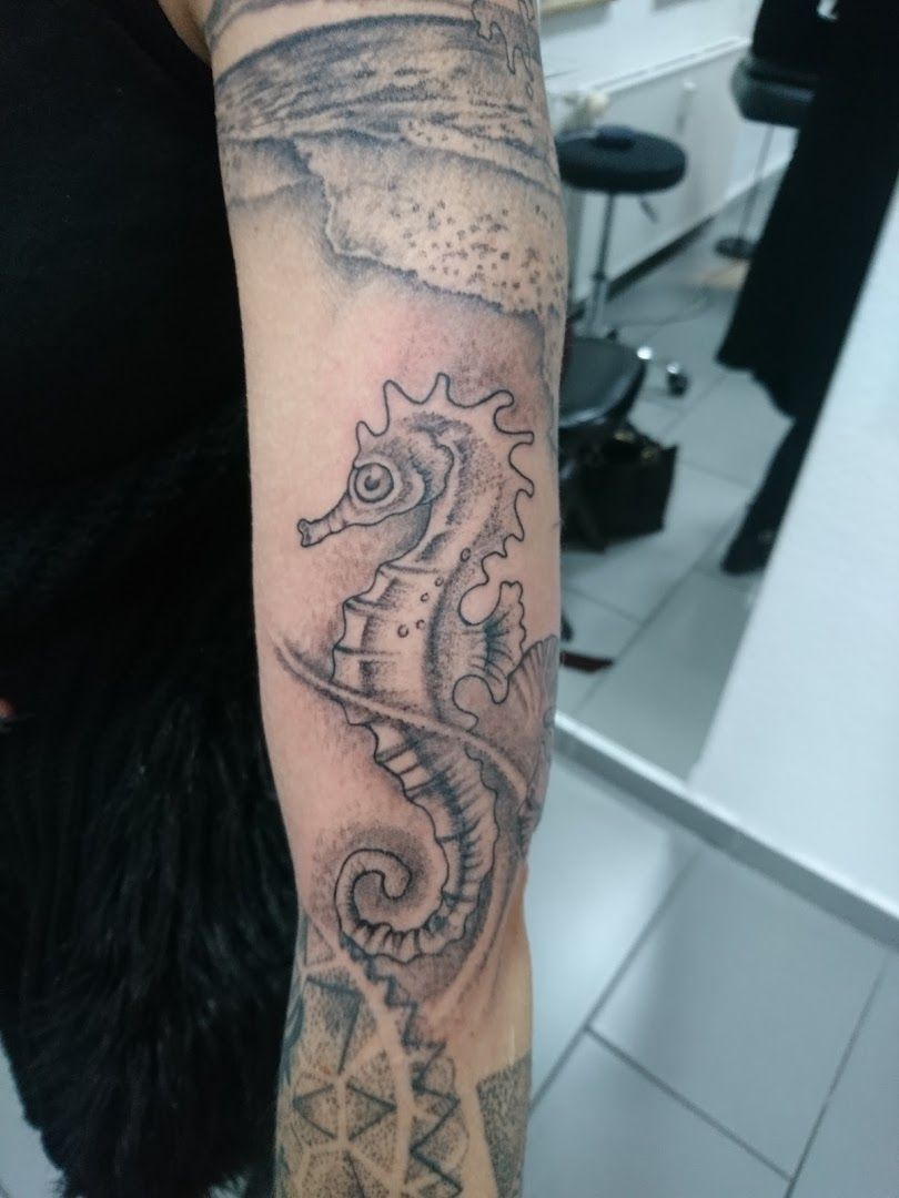 a woman with a narben tattoo on her arm, böblingen, germany