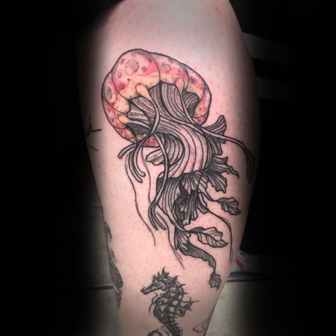 a narben tattoo of a jellyfish with a flower on its head, schleswig-flensburg, germany