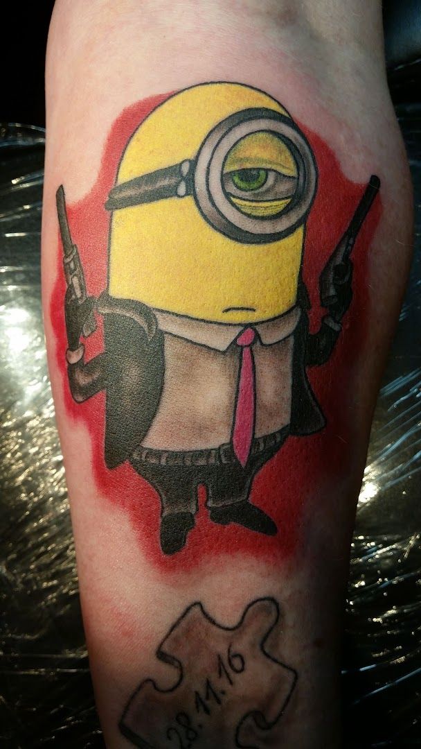 a narben tattoo of a minion with a gun, ammerland, germany