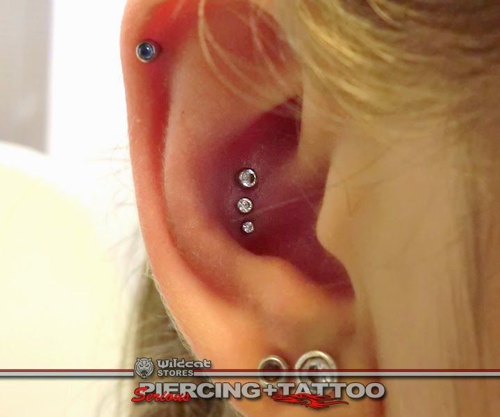 a woman with a piercing in her ear