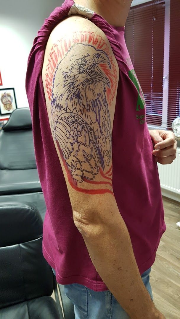 a man with a japanische tattoos in leipzig on his arm, rhein-sieg-kreis, germany
