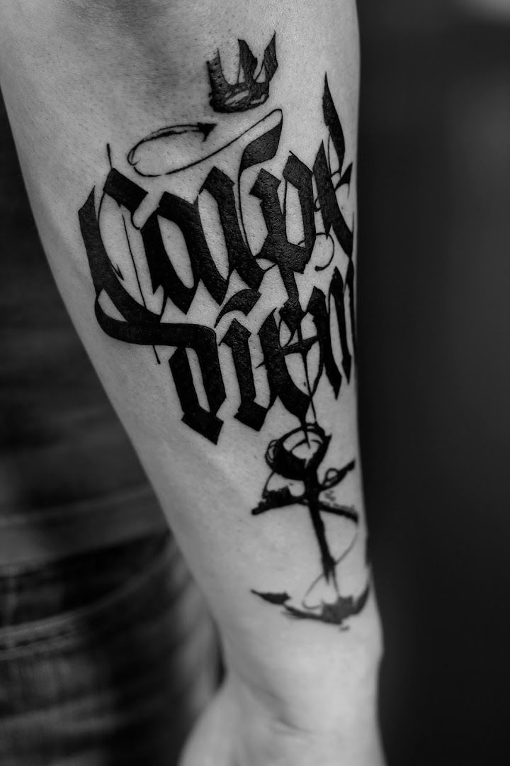 a black and white narben tattoo design on the arm, berlin, germany