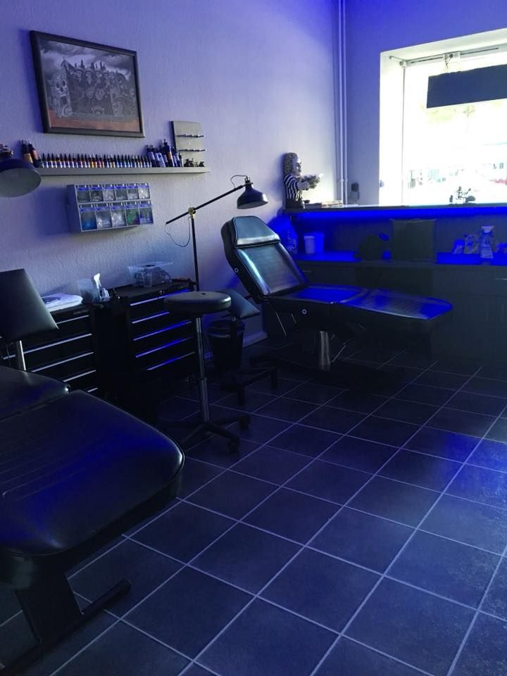 a room with a desk and chair in it