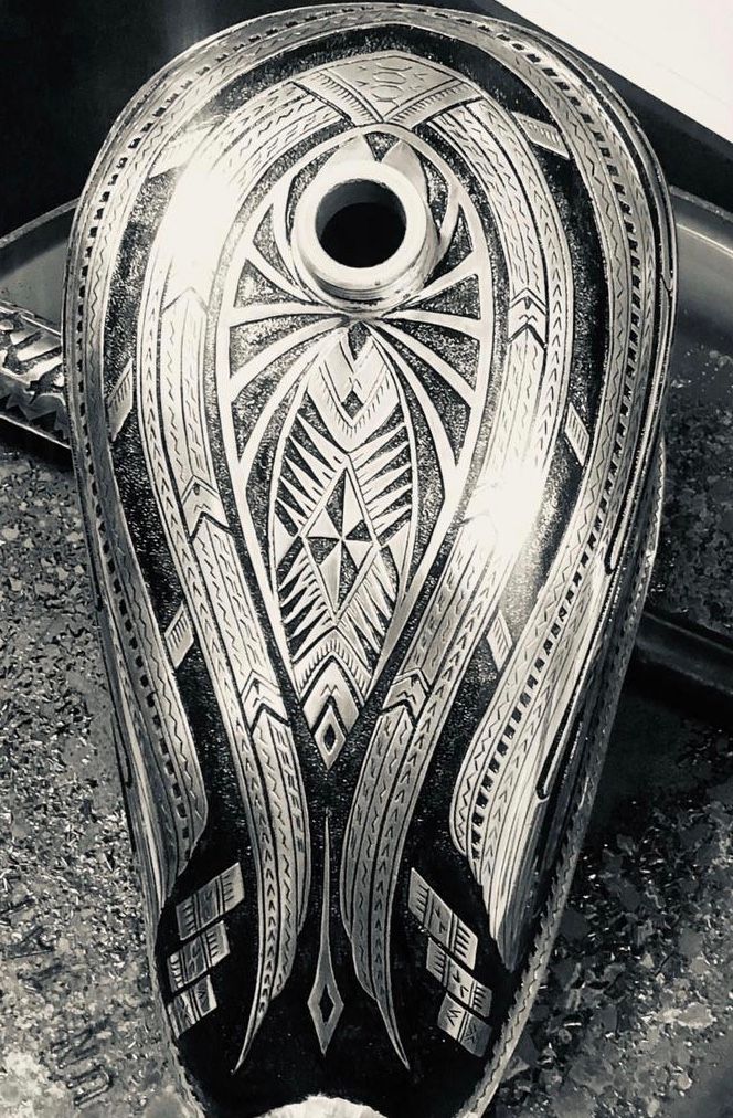 a black and white photo of a vase