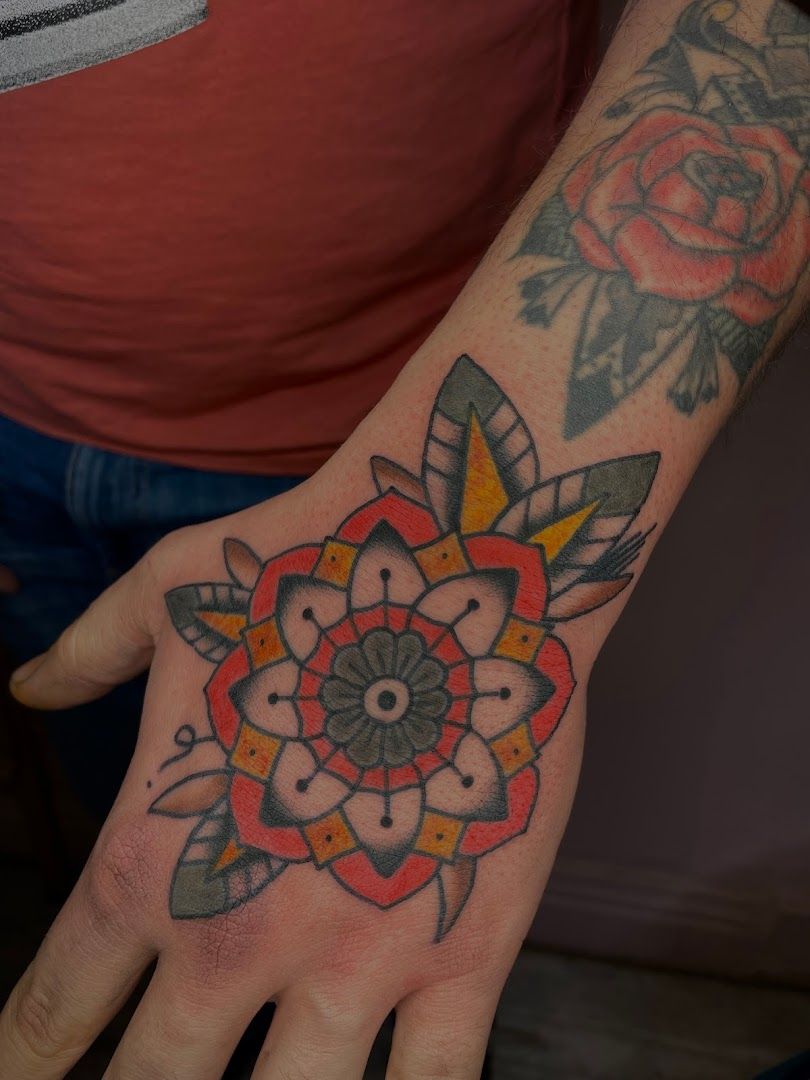a man's hand with a japanische tattoos in leipzig design on it, bayreuth, germany