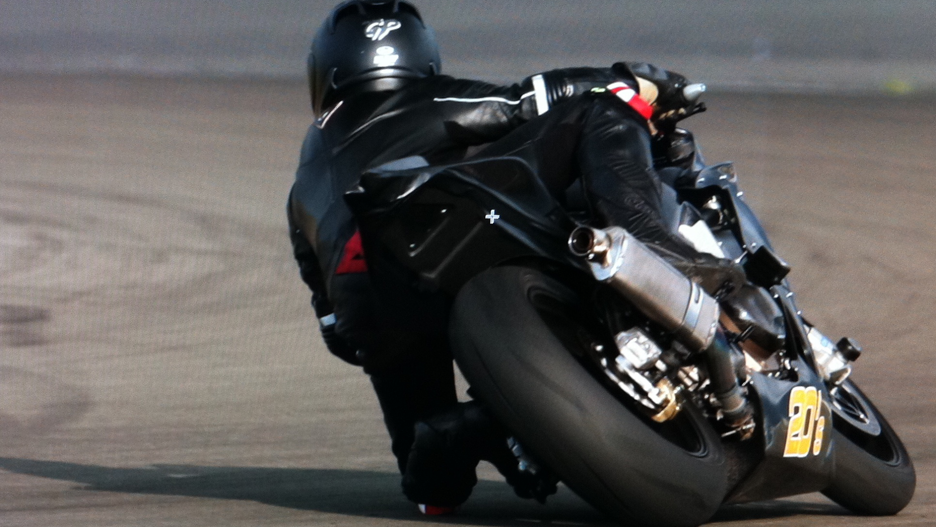 a person riding a motorcycle on a road