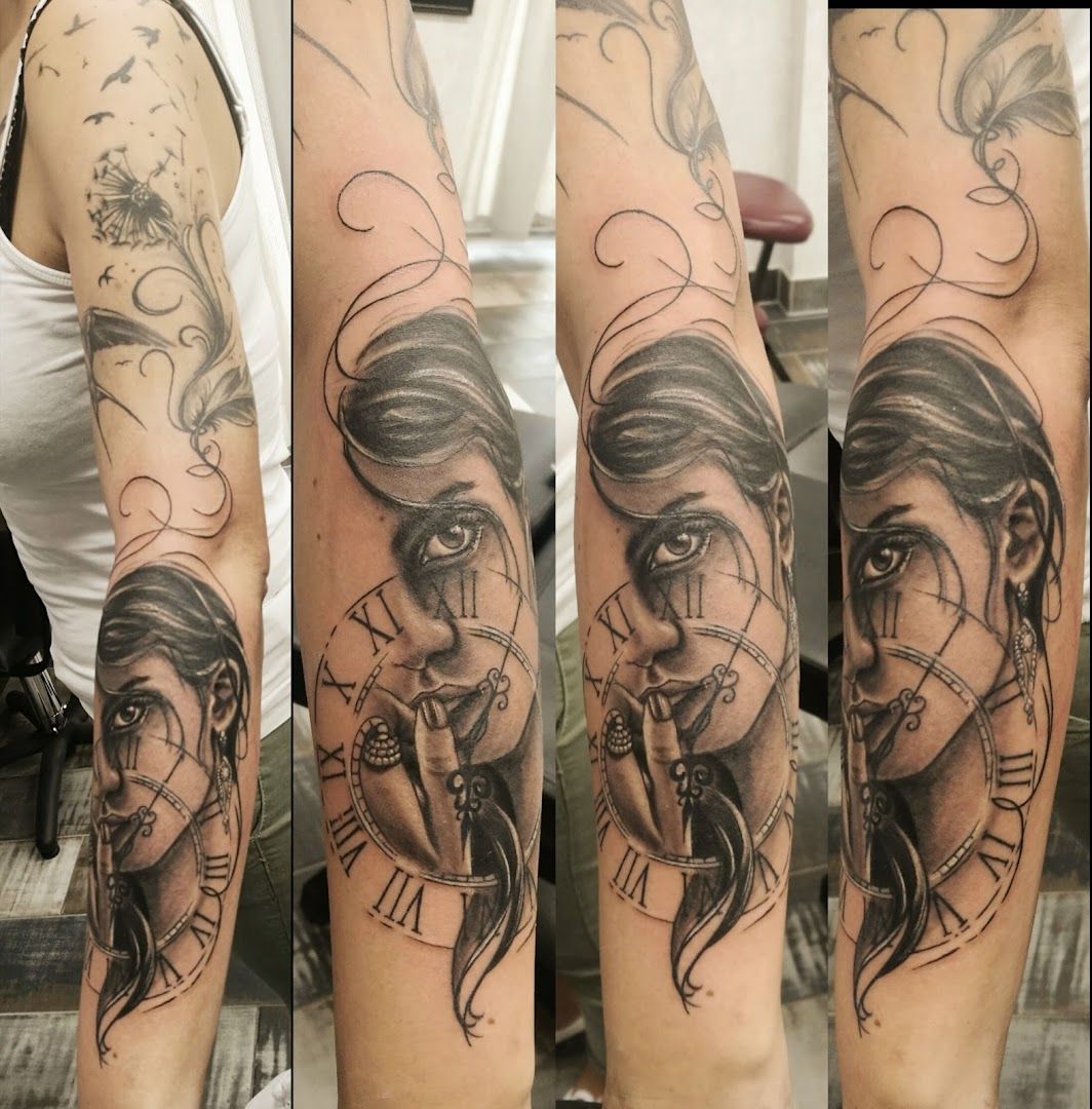 a woman's face with a clock cover-up tattoo on her arm, barnim, germany