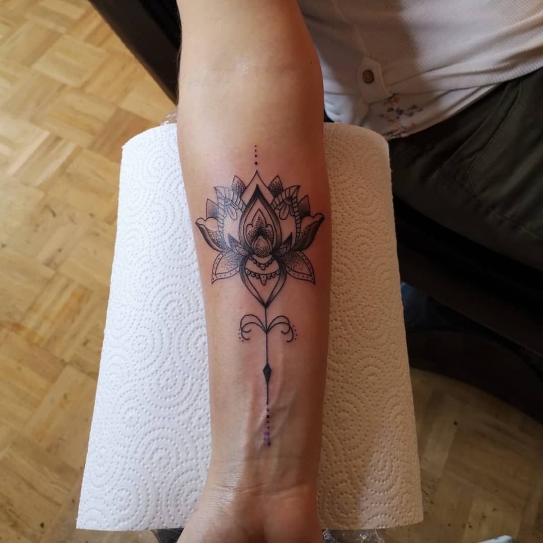 lotus flower cover-up tattoo on the wrist, rosenheim, germany