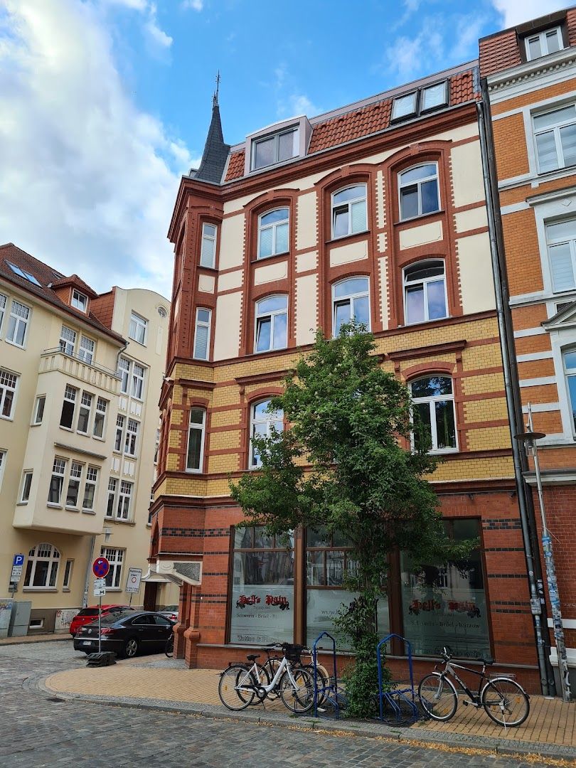 a building with a bicycle parked in front of it