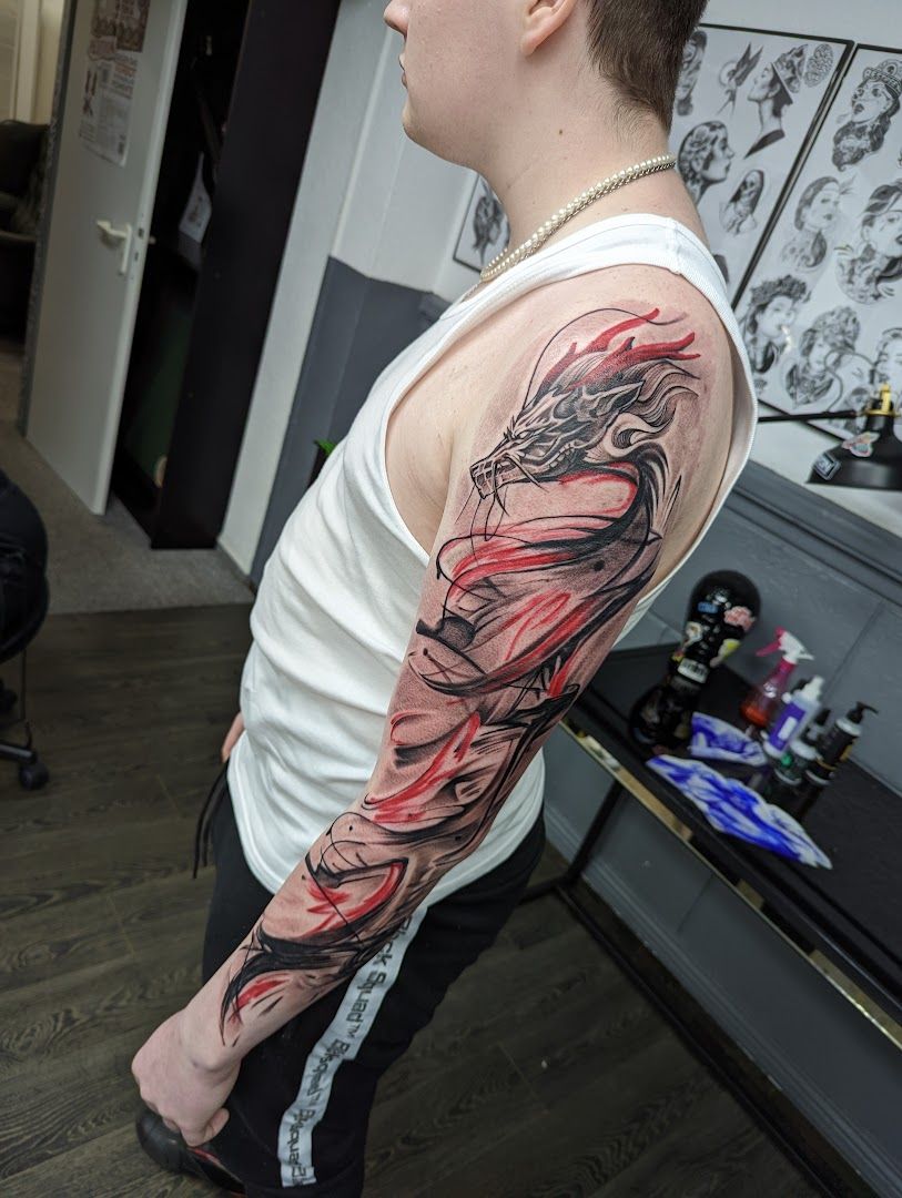 a man with a cover-up tattoo on his arm, wuppertal, germany