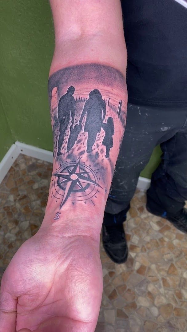 a man with a cover-up tattoo on his arm, diepholz, germany