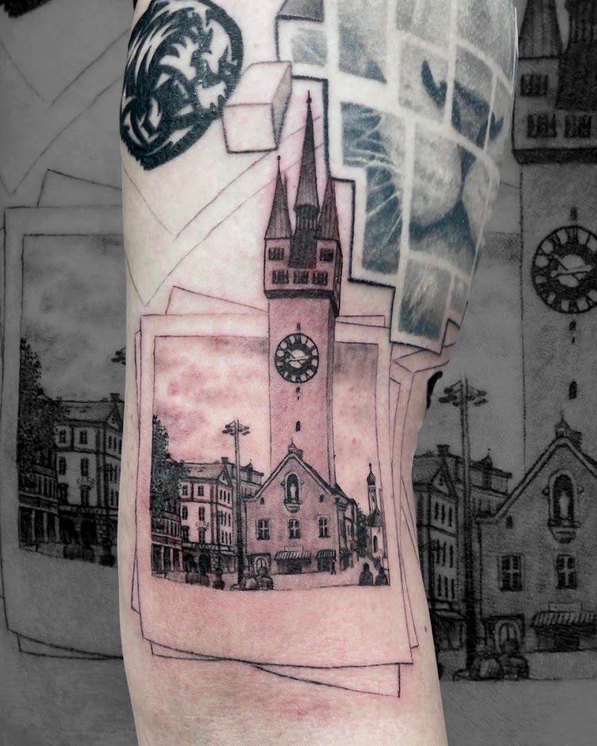 a narben tattoo of a church and a clock, freising, germany
