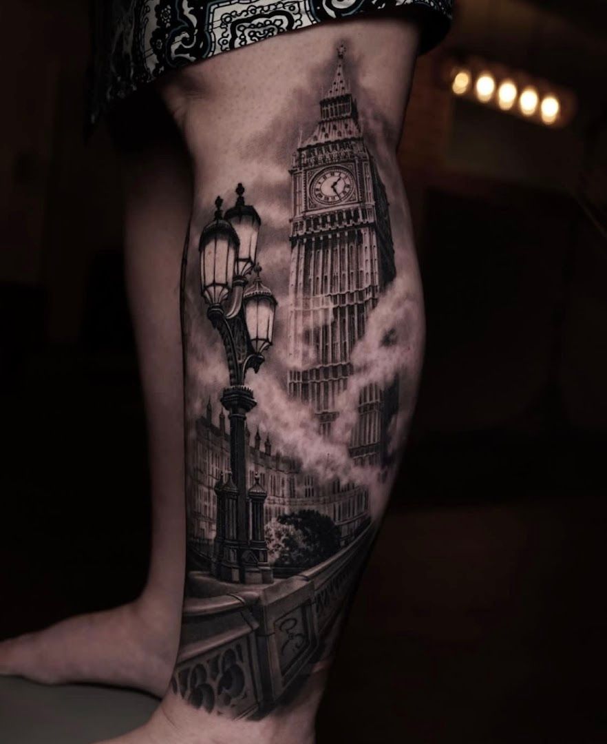 a man's leg with a black and white cover-up tattoo of big ben and big ben clock, wetteraukreis, germany