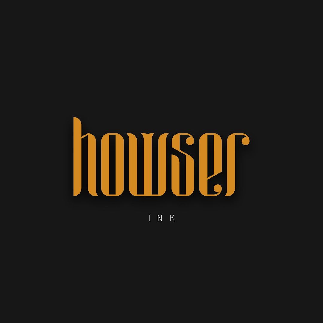 the word boss in gold on a black background