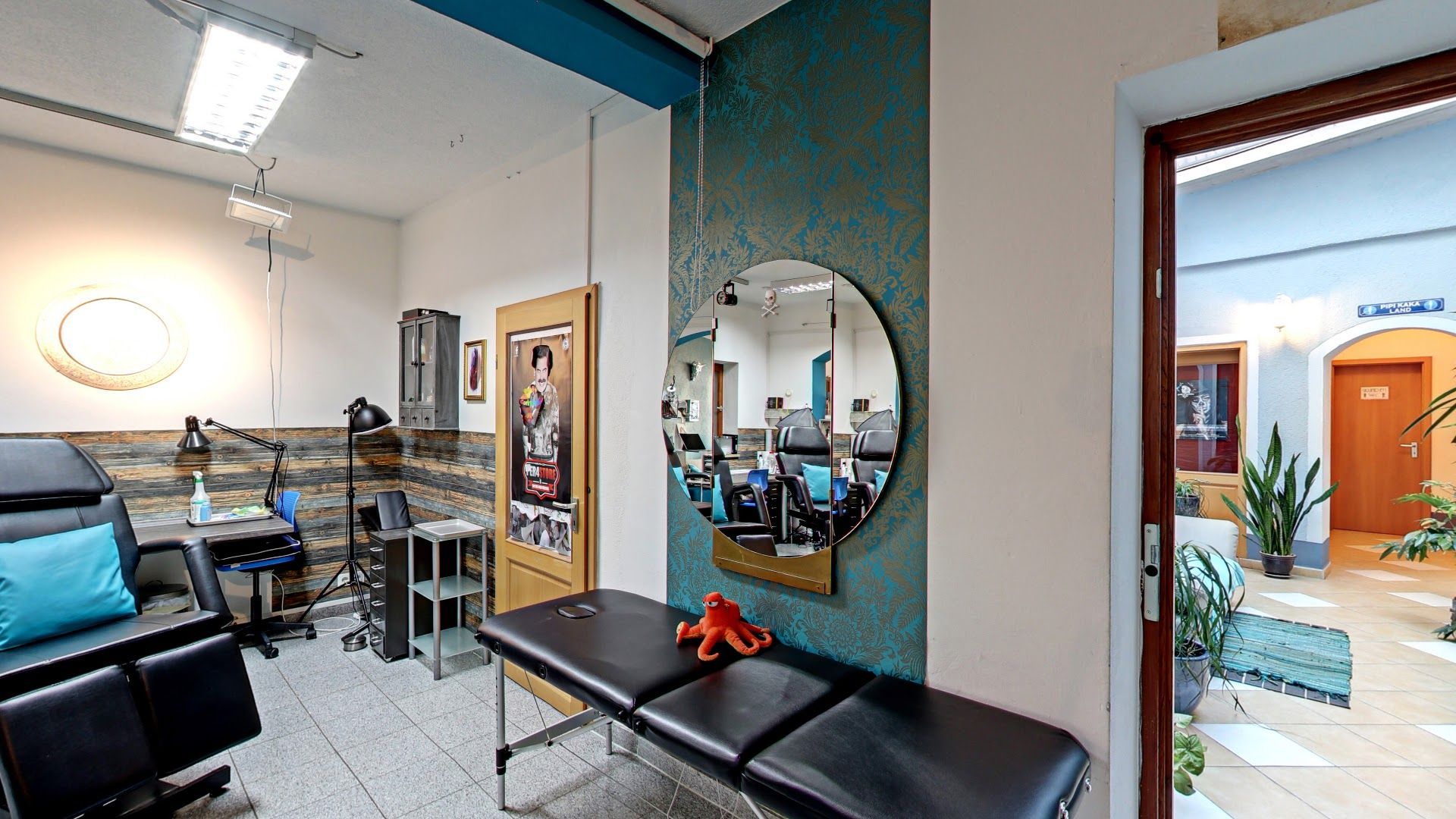 a salon with a mirror and chairs