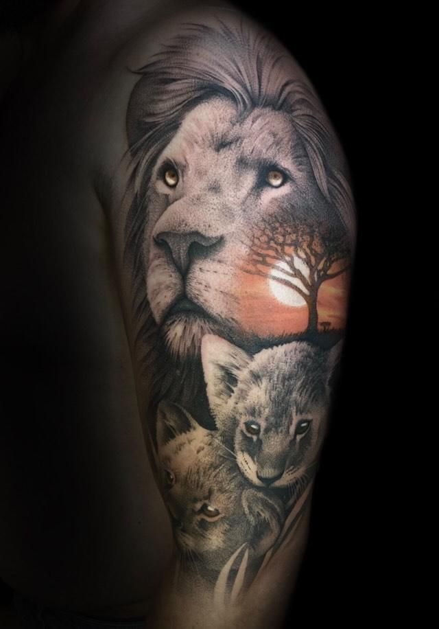 a cover-up tattoo of a lion and a tree, rhein-sieg-kreis, germany