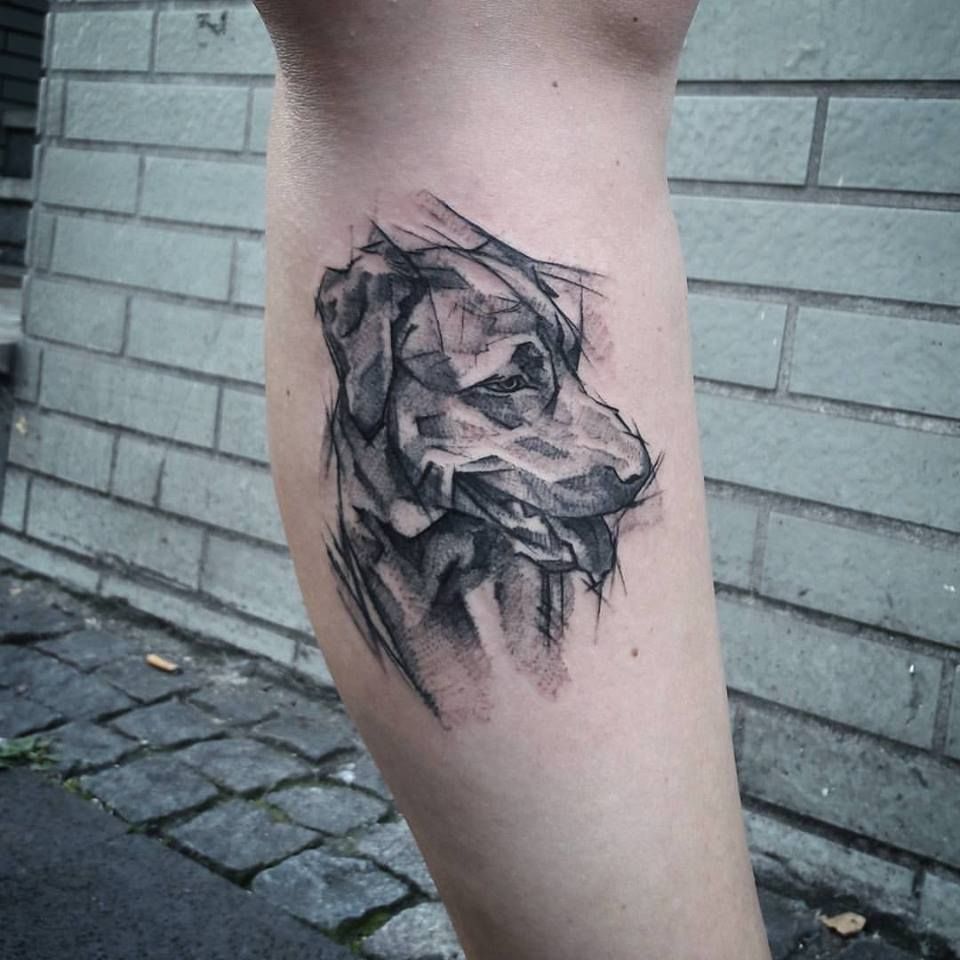 a narben tattoo of a lion on the leg, darmstadt-dieburg, germany
