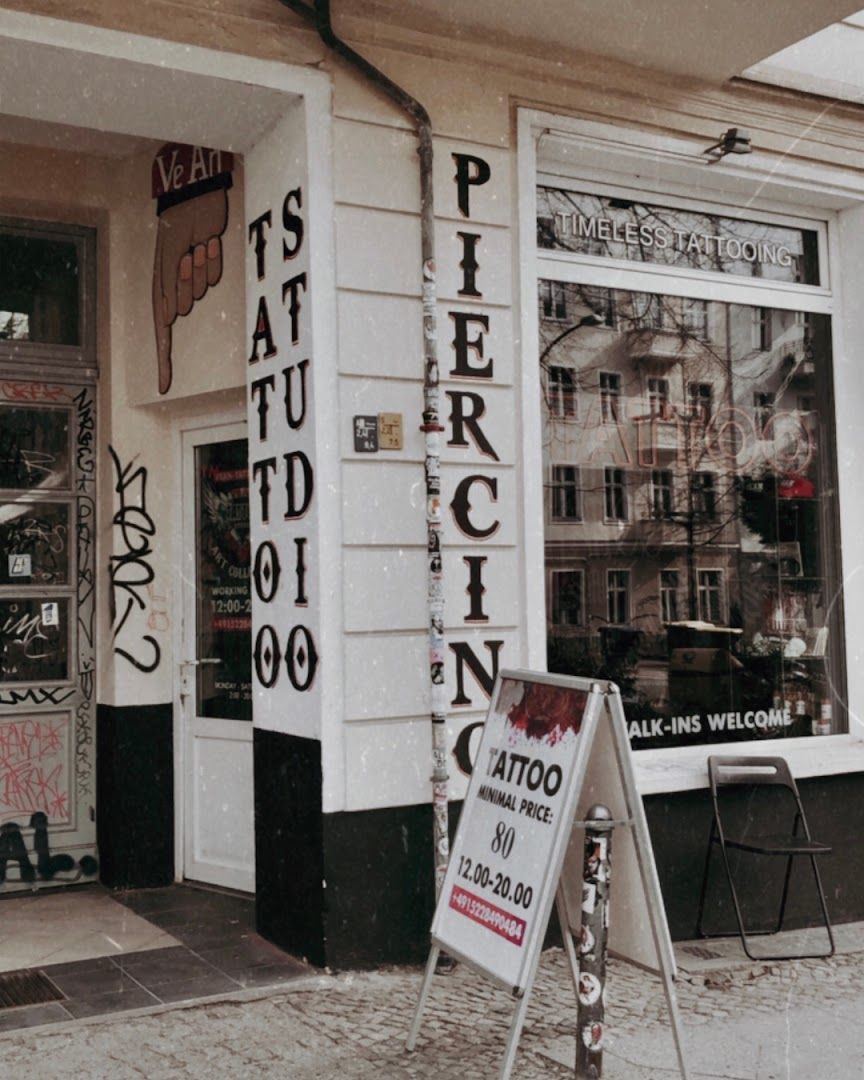 a store front with graffiti on the windows