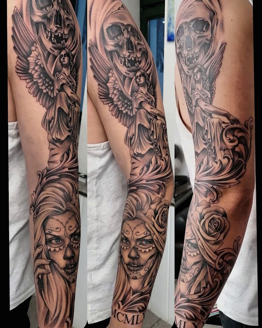 a black and grey cover-up tattoo with a skull and angel, chemnitz, germany