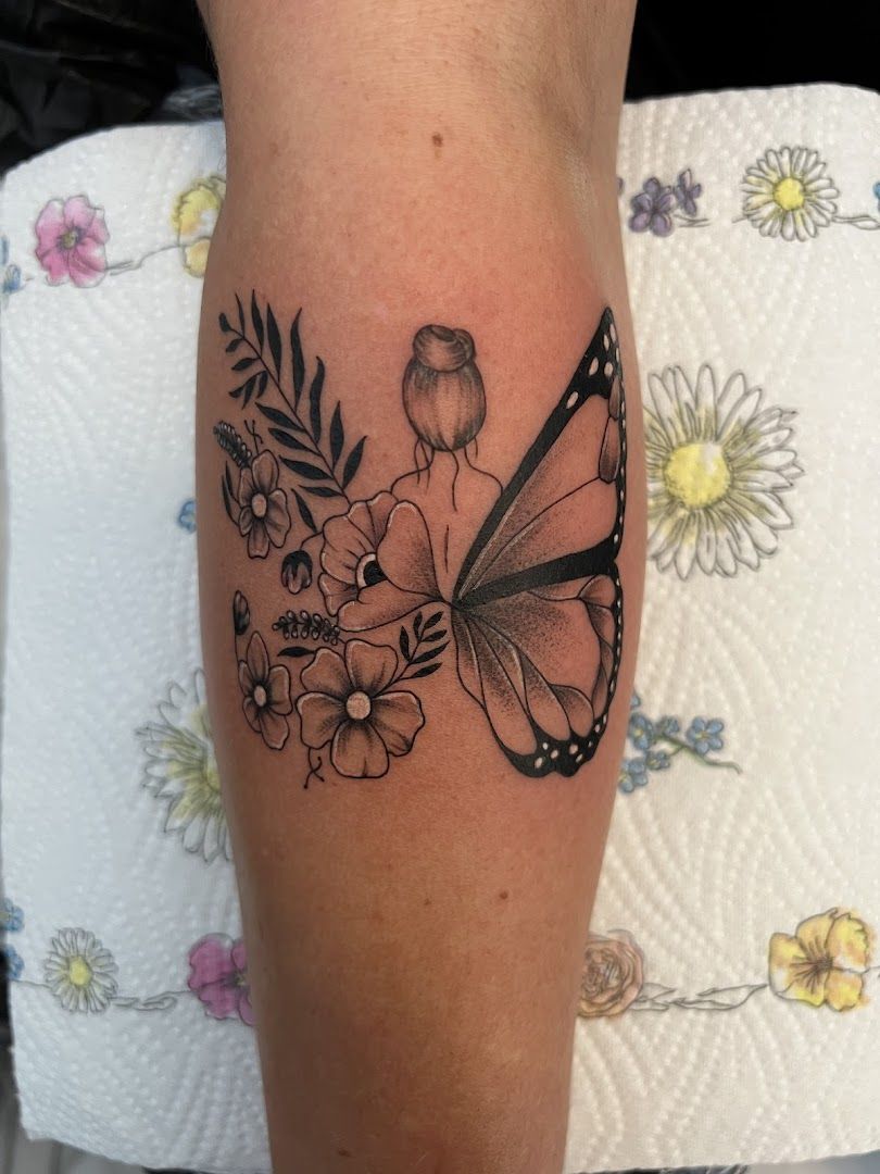 a butterfly narben tattoo on the leg, burgenlandkreis, germany