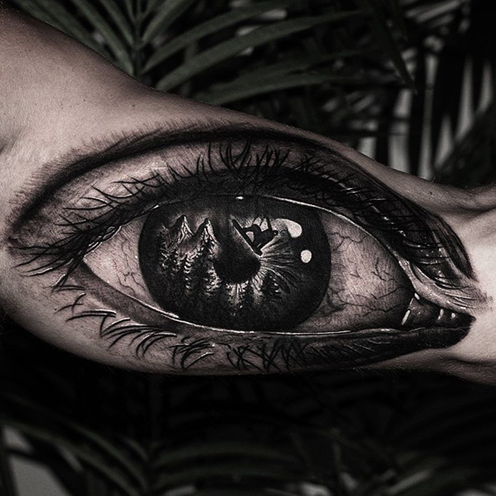 a black and white cover-up tattoo of an eye, berlin, germany