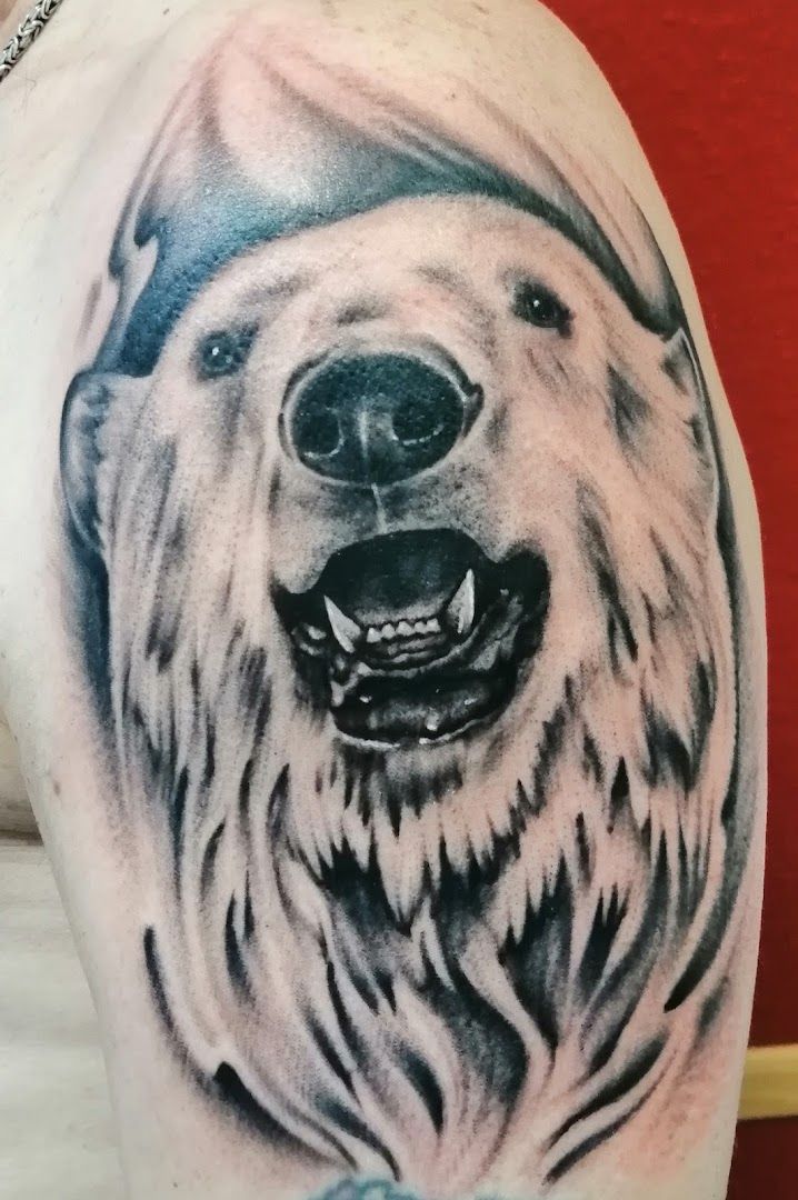 a black and white narben tattoo of a bear, dahme-spreewald, germany