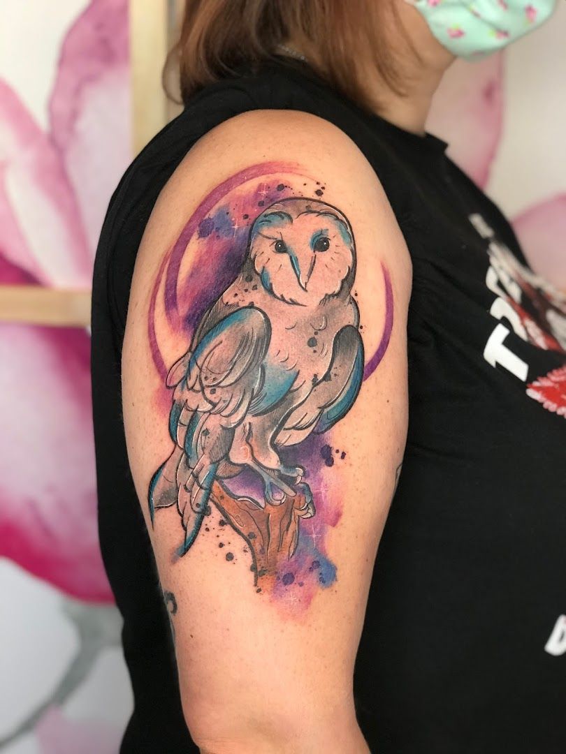 a woman with a cover-up tattoo on her arm, rhein-pfalz-kreis, germany