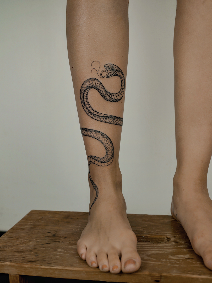 a person with a narben tattoo on their leg, bayreuth, germany