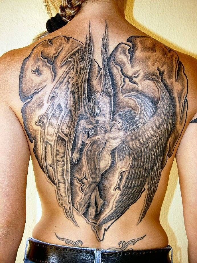 a woman with a cover-up tattoo on her back, nürnberg, germany