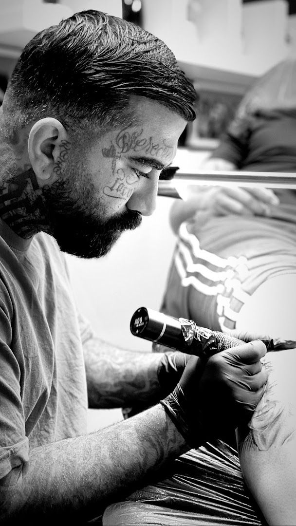 a man with a beard and a cover-up tattoo, berlin, germany