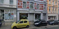 a street with cars parked on the side of it