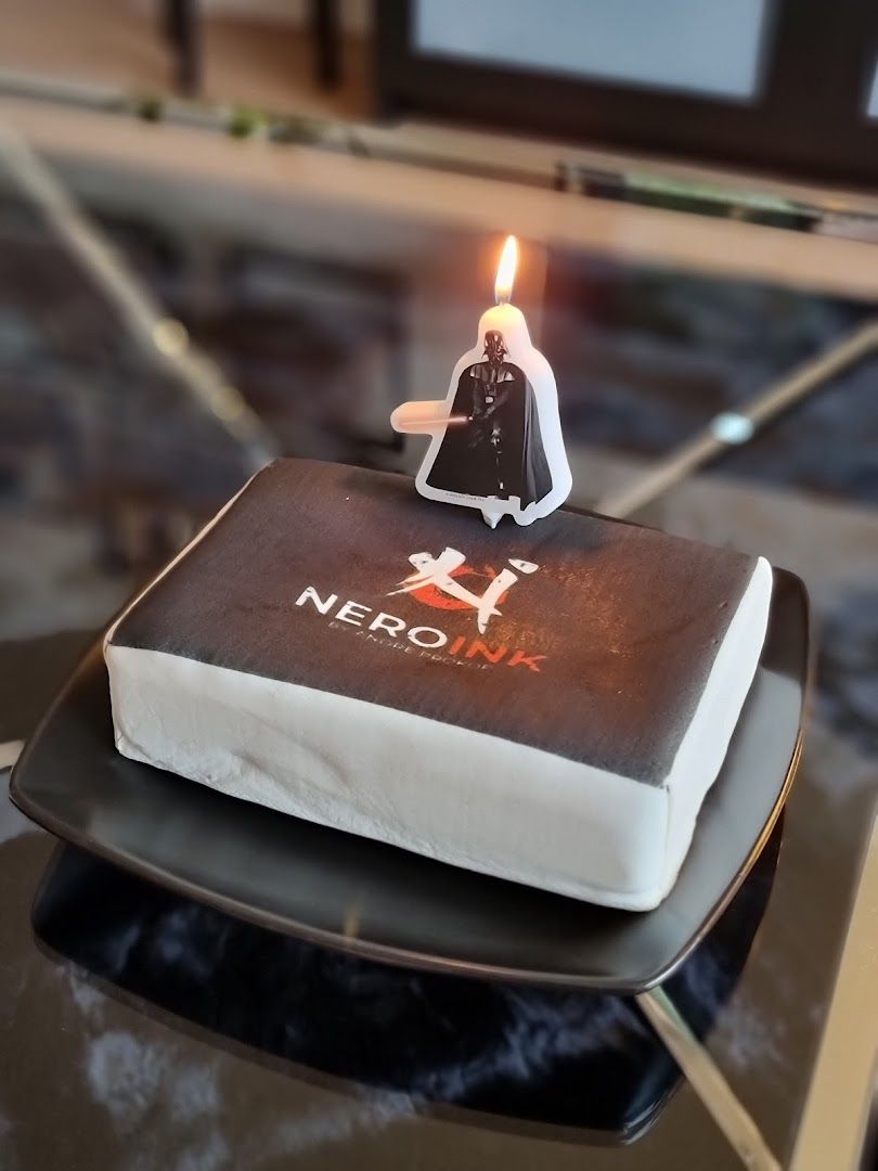 a star wars cake with a dart on top