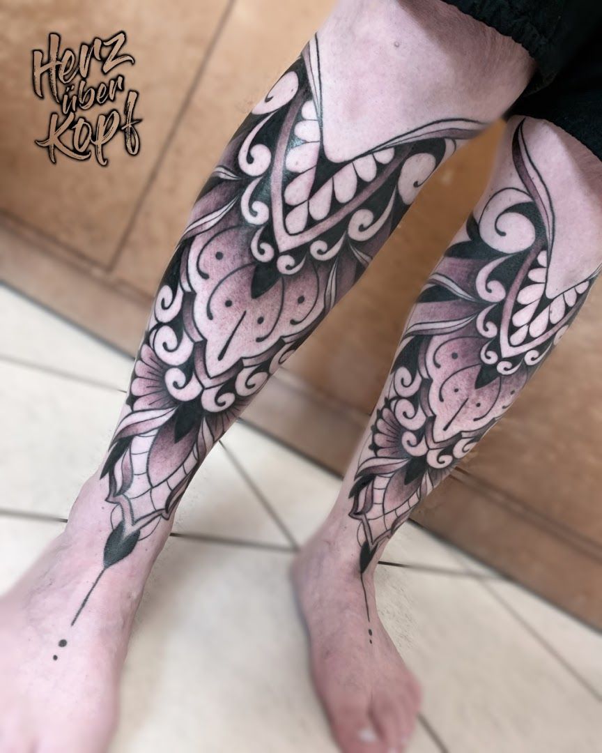 a man's leg with a cover-up tattoo design on it, offenbach, germany