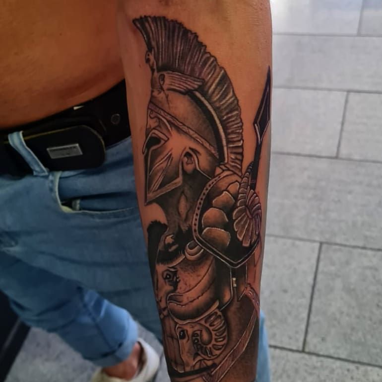 a man with a cover-up tattoo on his arm, kreisfreie stadt heilbronn, germany