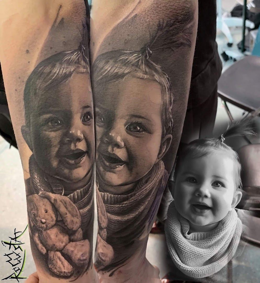 a cover-up tattoo of two children, one with a baby and the other with a baby, salzlandkreis, germany
