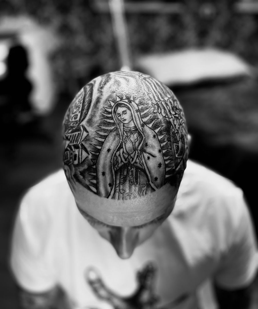 a man with a narben tattoo on his head, greiz, germany