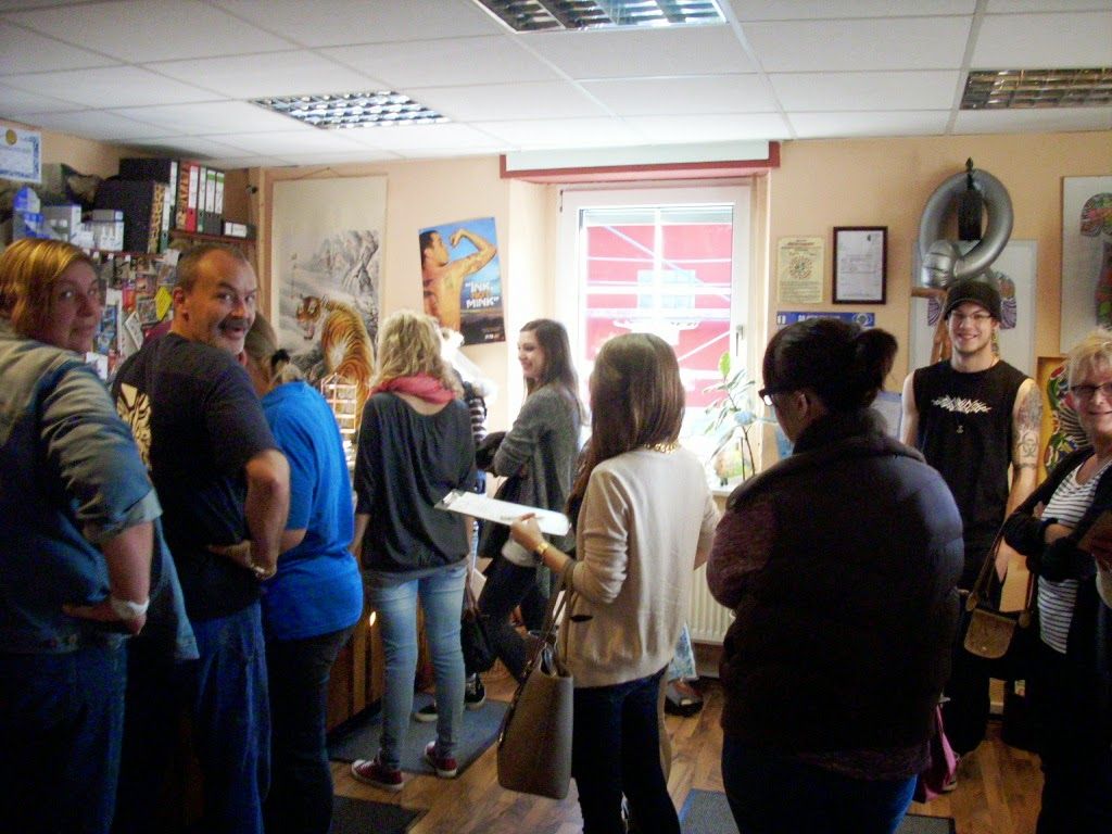 a group of people standing in a room