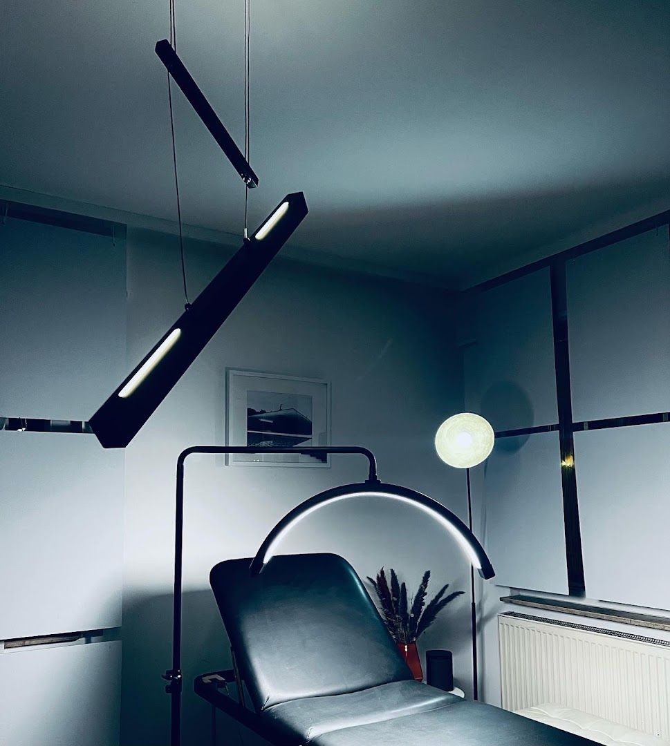 a chair with a lamp on it in a room