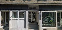 a building with a sign that says the entrance to the restaurant