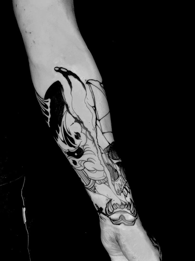 a narben tattoo of a man's arm with a black and white tattoo design, berlin, germany