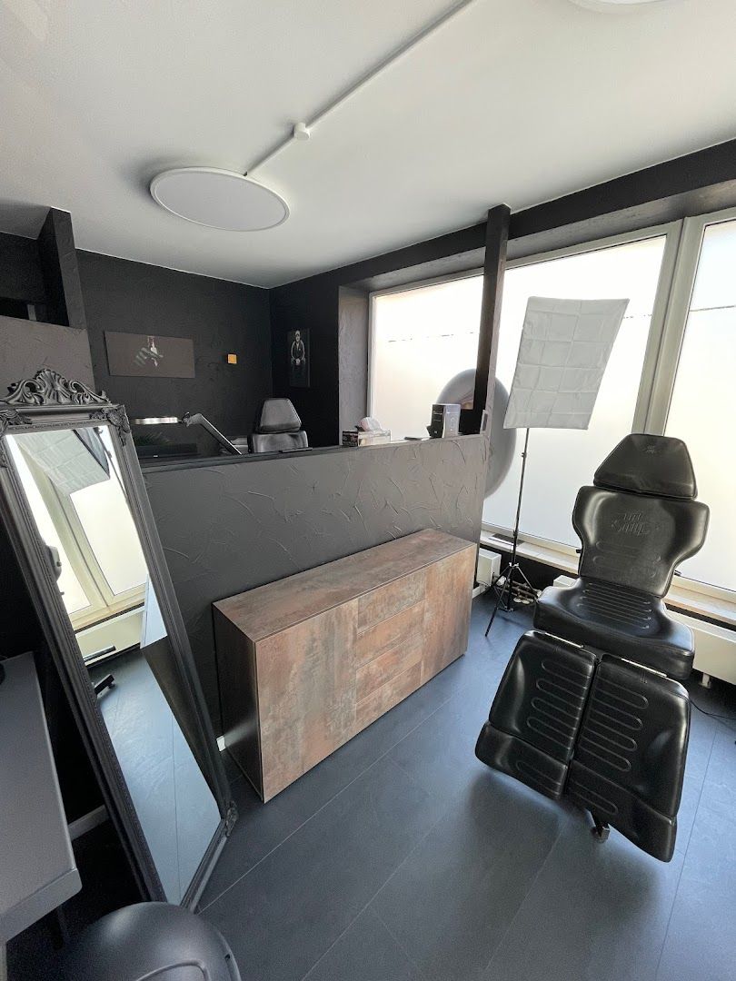 a room with a desk and chair in it