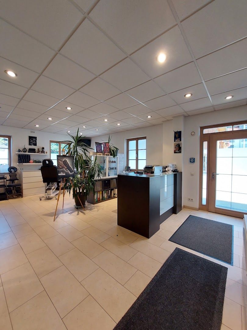 a large office with a large plant in the middle
