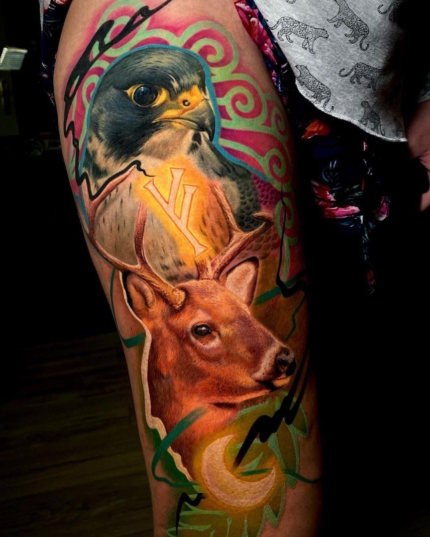 a cover-up tattoo with a bird and a deer, berlin, germany