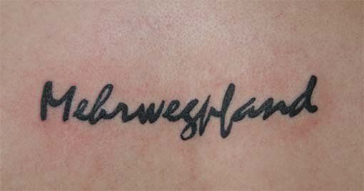 a narben tattoo with the word'neverland'written on it, oberbergischer, germany