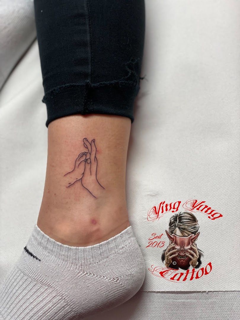 a woman's foot with a narben tattoo on it, berlin, germany