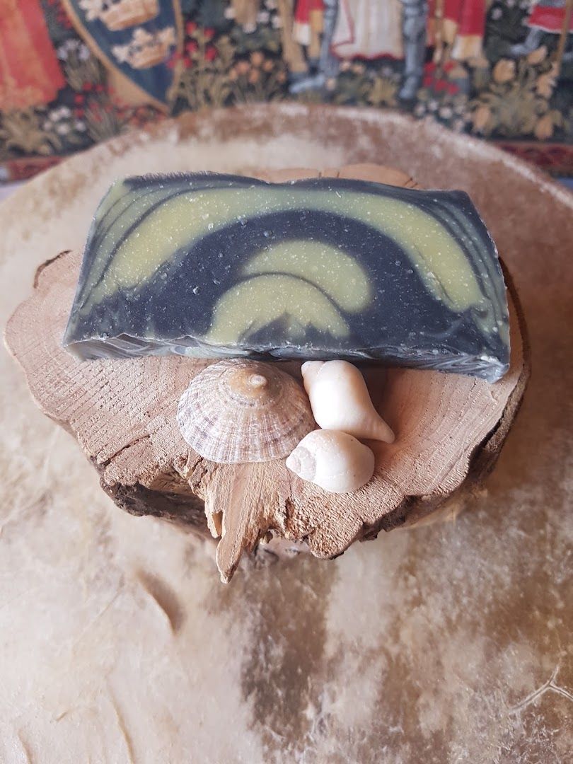 a soap bar with a green and white swirl on top