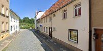 a narrow street in the old town of rothsberg