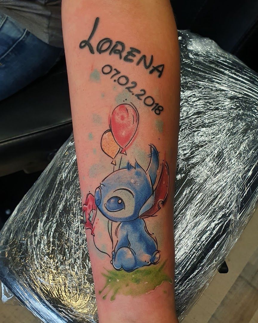 a narben tattoo with a watercolor tattoo design on the arm, märkischer kreis, germany