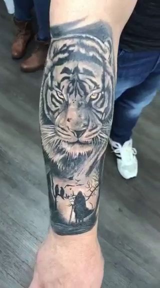 a tiger cover-up tattoo on the wrist, nürnberg, germany