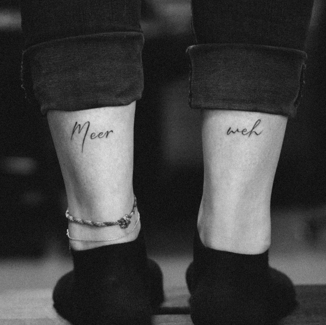 a woman's feet with a cover-up tattoo on her ankle, kassel, germany